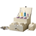 HL Skin DMO Kit showcased in a premium display box with full-sized skincare products and accessories.