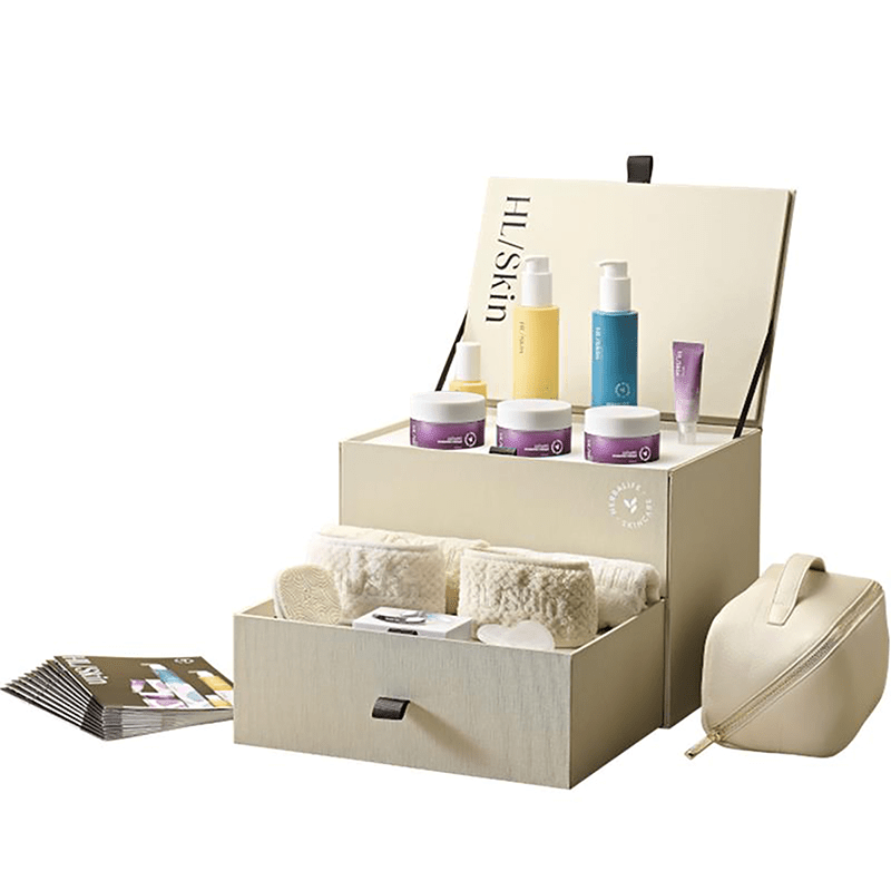 HL Skin DMO Kit showcased in a premium display box with full-sized skincare products and accessories.