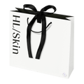Premium Gifting Bag Large in matte-laminated paper with black accents and elegant ribbon for premium gifting.