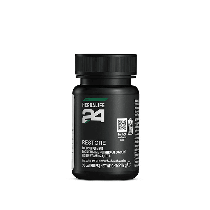 Restore 30 capsules in black container for night-time nutritional support, rich in vitamins A, C, and E for athletes.